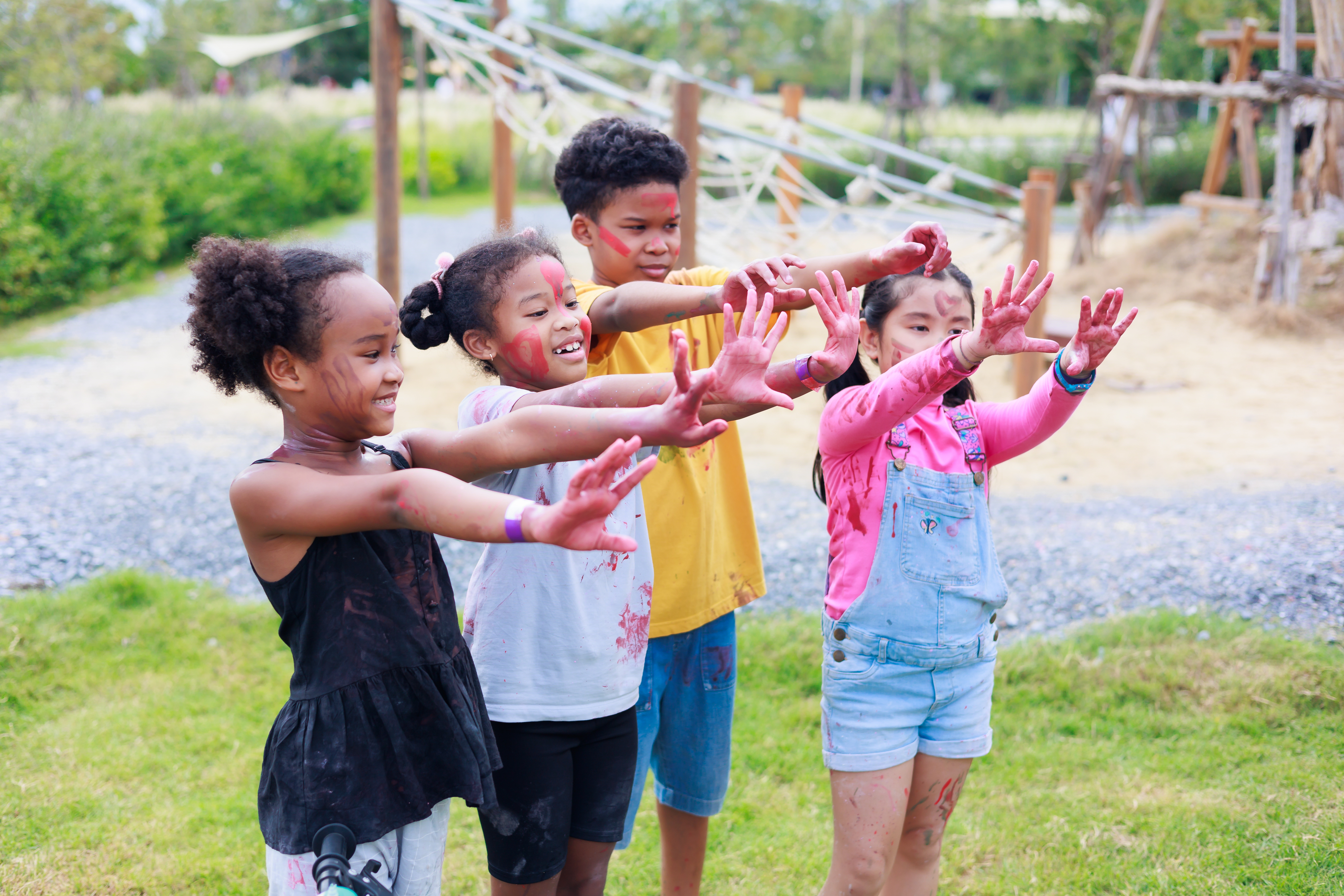 Kids at camp with paint on them
